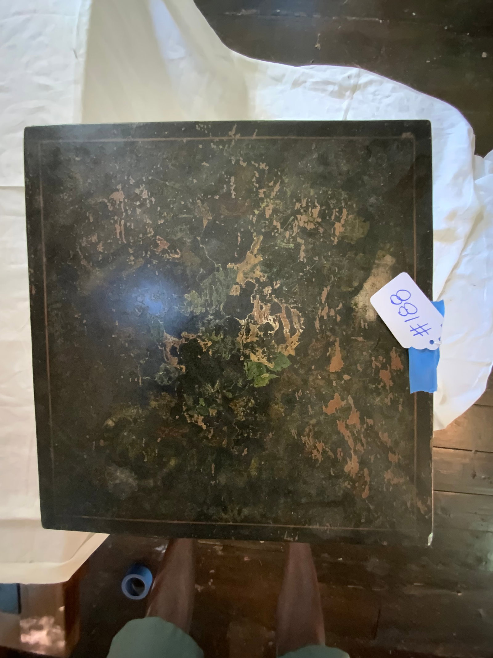 Tilt Top Stand: Tilt top stand, painted w/ black, gold & red coming through, 3 legs w/ padded foot, 15" x 15" top, 28" tall, early repair on leg. Fair condition.