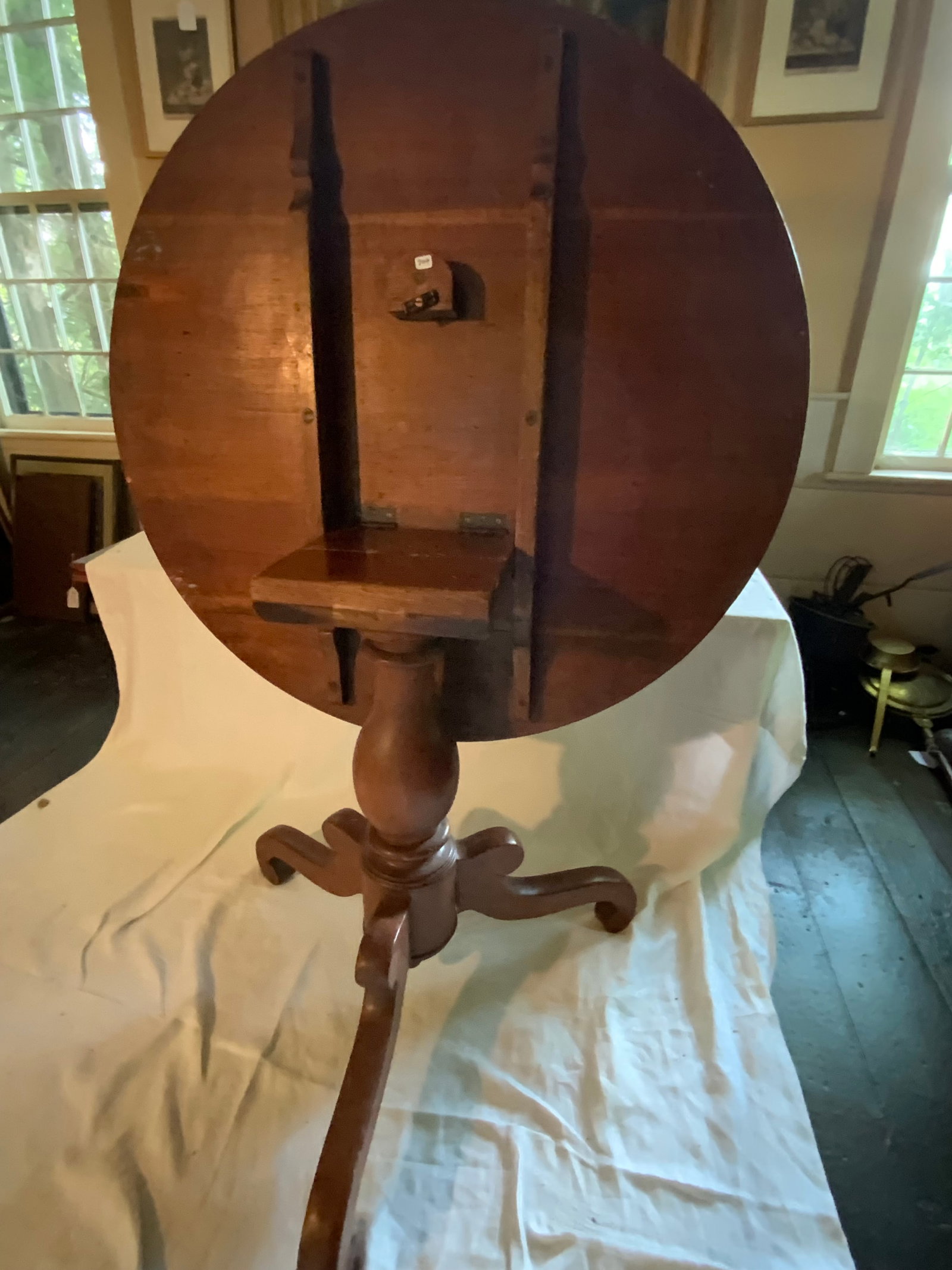 Tilt Top Tea Table: Tilt top tea table, ring turned center post, walnut w/ 3 scrolled legs, 35 1/2" round, 29" tall. Good condition.