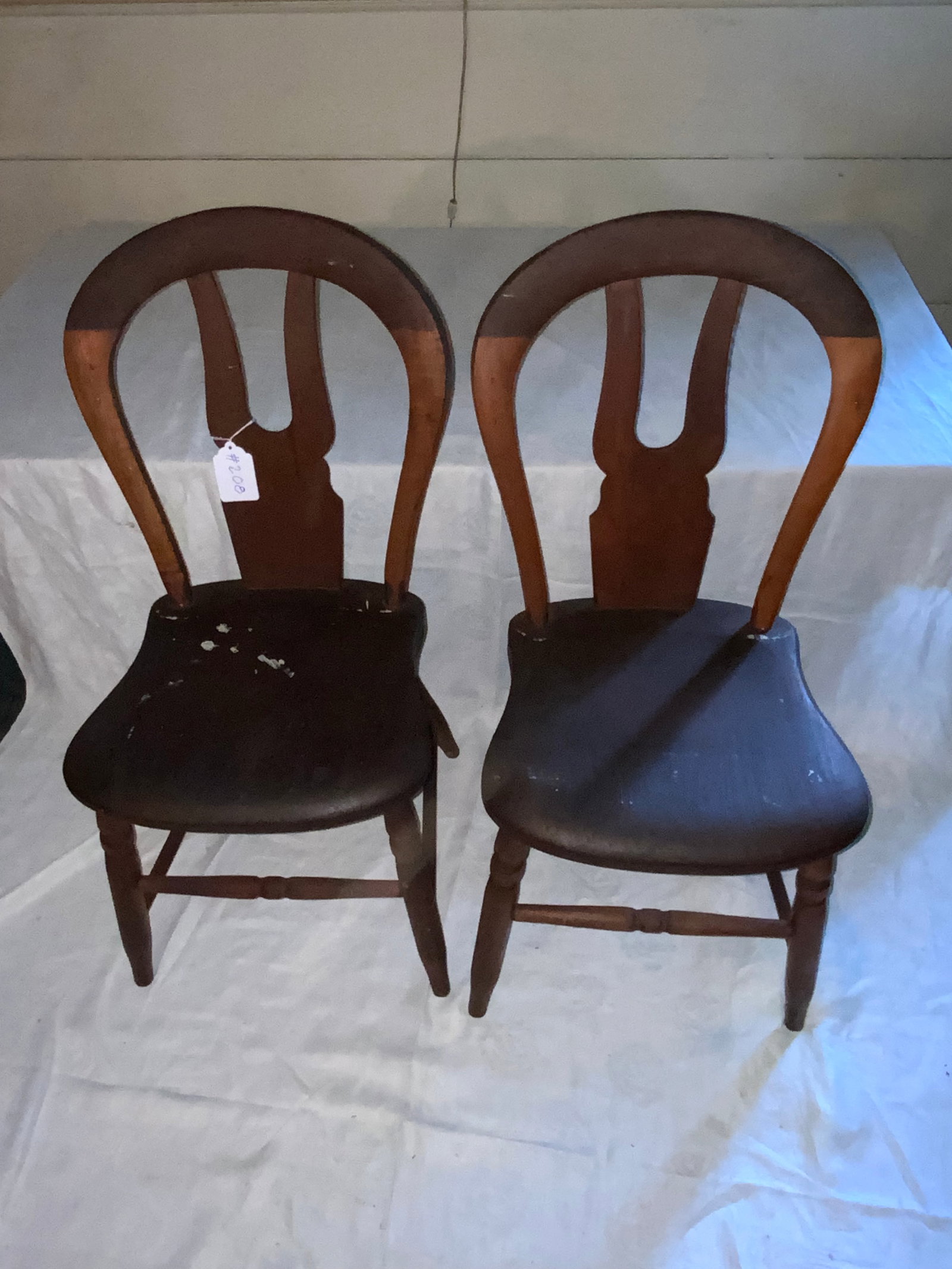 Walnut Side Chairs: Pair of walnut vase-back side chairs, saddle seats, midwestern. Good condition.