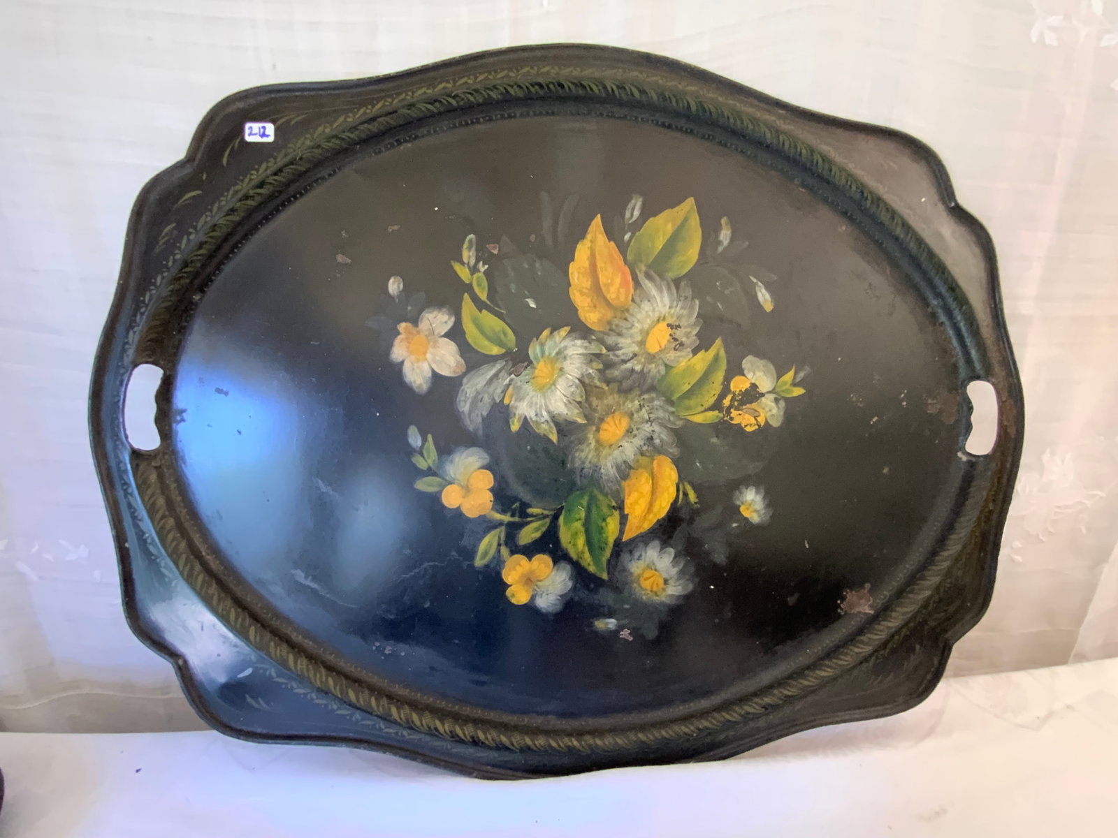 Tin Tole Trays: 3 tin tole painted trays, 26 1/2" x 21" oval w/ handles, 24" x 18" rectangle, 22" x 12" oval. Fair condition.