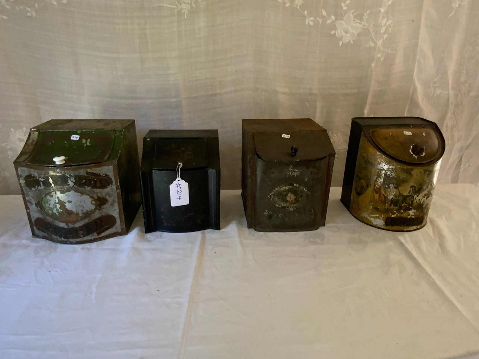 Tea & Spice Tins: Tea & spice tins, 4 tins: 1st green tin for pepper, 2nd black & gold signed Gina Martin 53, 3rd black w/ flowers, 4th stenciled yellow w/ gondola ginger tin. All in good condition.