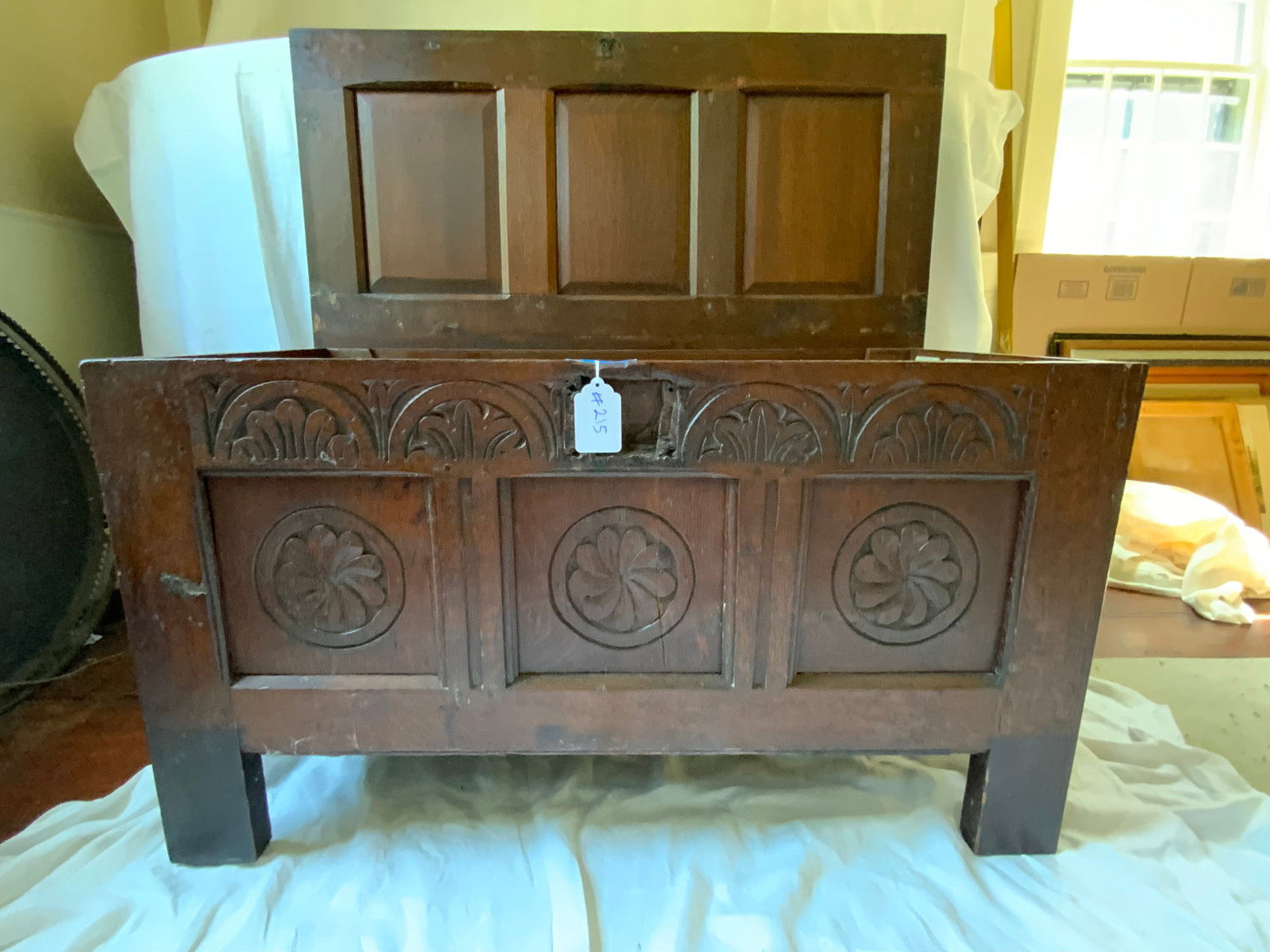 European Oak Blanket Box: Blanket box, European oak with paneled front, geometric pinwheel design, carved border, candle box on the inside, 41 1/2" wide x 19 1/2" deep by 23 1/2" tall, missing original lock. Fair condition.