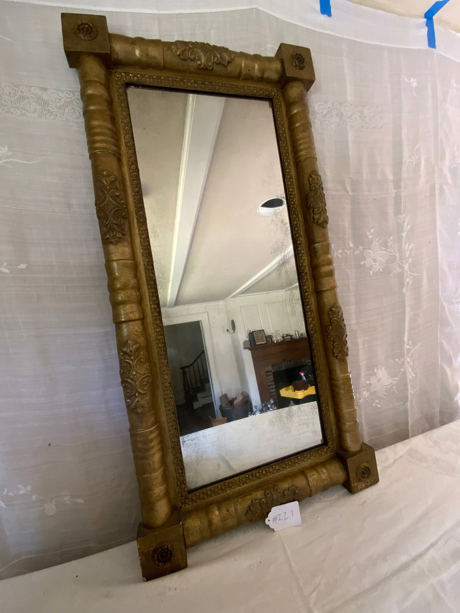 Federal Gold Gilt Mirror: Federal gold gilt mirror with rosettes in corner, split baluster style with decorations, 39 1/2 inches tall by 20 inches wide. Good condition.