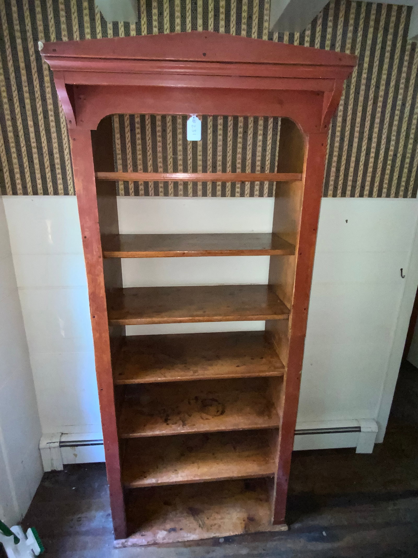 Open Cupboard Shelf: Open cupboard shelf, red varnished surface, peaked cornice, 33 1/2" wide, 16 1/2 inches deep, 78" tall. Good condition.