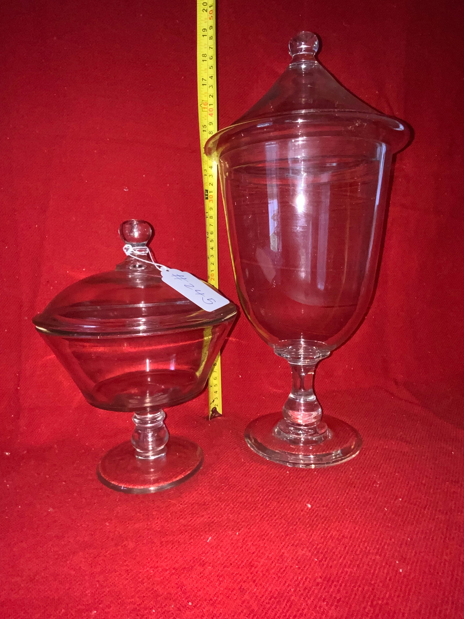 Covered Glass Jars: 2 clear early covered containers w/ lids, hand blown. Good condition.
