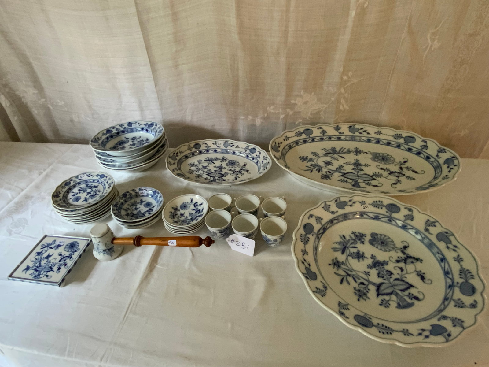 Meissen Blue Onion China: Meissen blue onion pattern: large platter 21" x 14 1/2", small platter 13 1/4" x 9 3/4", large serving bowl 14 1/2" round, 9 6 1/4" sauce bowls, 5" bowls, 6 4 1/4" small bowls, 5" x 5" trivet with a