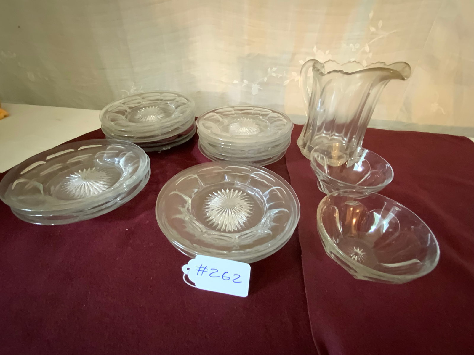 Heisey Glass Lot: Heisey glass, 20 piece lot: two bowls, one water pitcher, and 17 plates. Good condition.