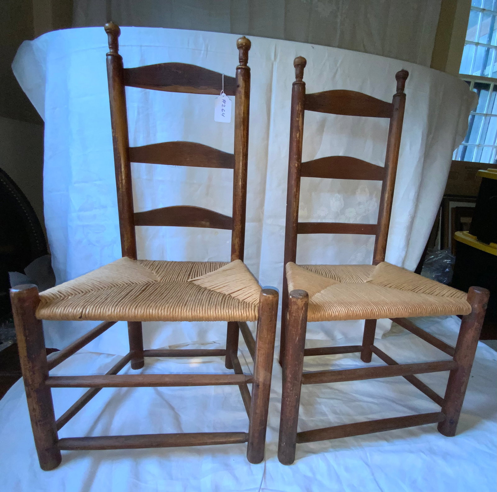 Slat Back Chairs: Pair of early slat back chairs, turned tops, old red paint showing, replaced seats. Good condition.