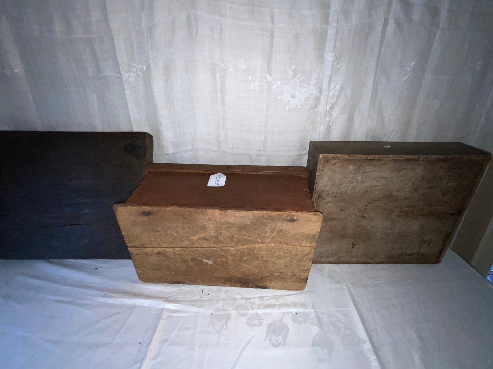 Boxes: 2 boxes: 18 1/2" x 16" x 5" tall w/ removable lid; old red painted box 19" x 12 1/2" tall w/ strap hinge. Good condition.