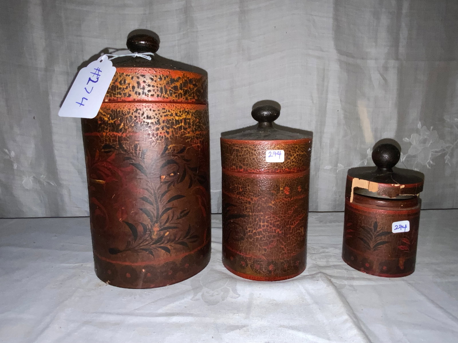 Wooden Treen Containers: 3 covered wooden treen containers, red finish, small one has broken lid - tall is 11 1/2" tall, medium is 8" tall, small one is 6" tall.