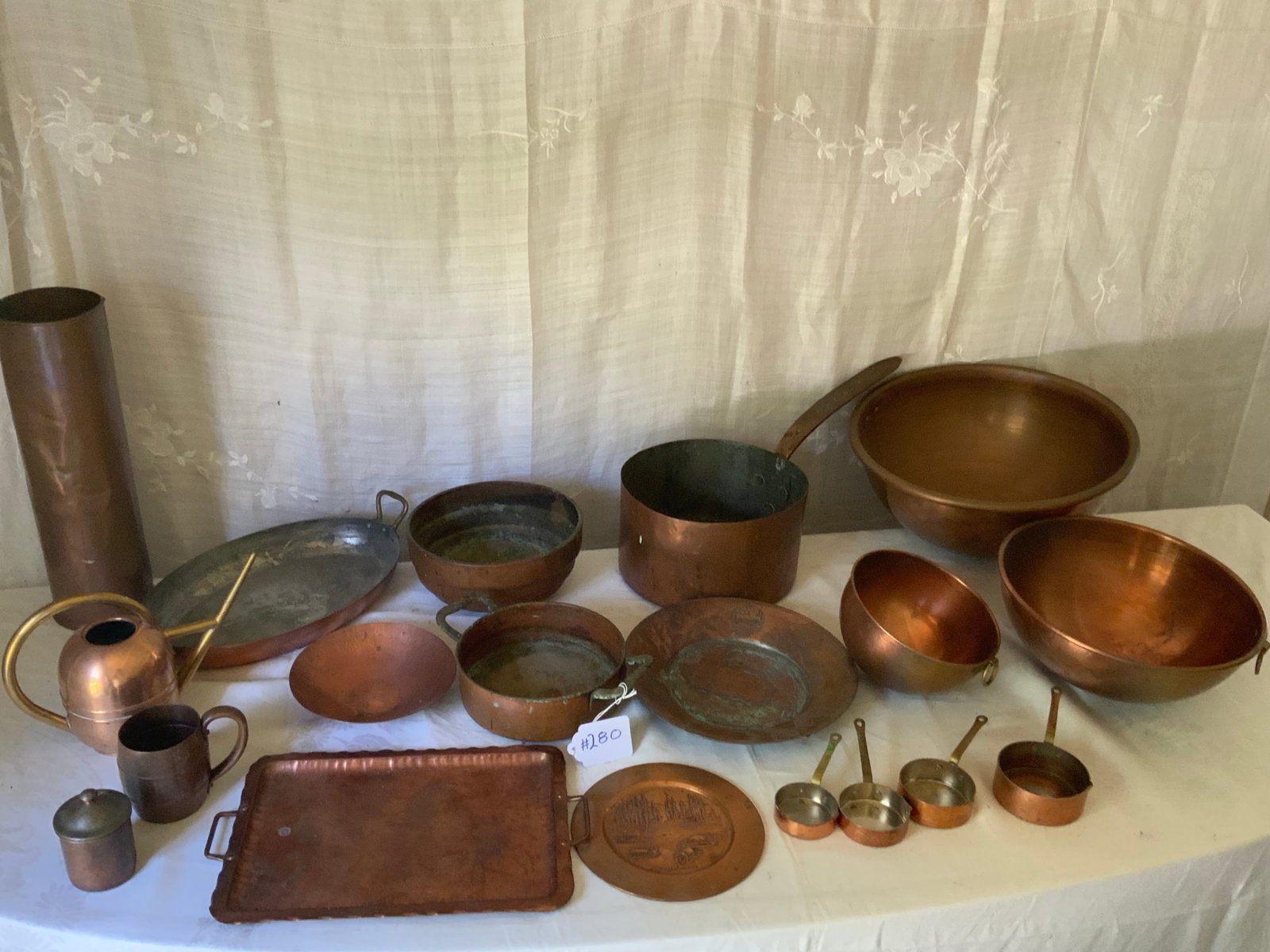 Copper Kitchen Items: Lot of 19 copper kitchen items: bowls, pans, trays, pot, watering can, etc. Variety of ages, overall good condition.