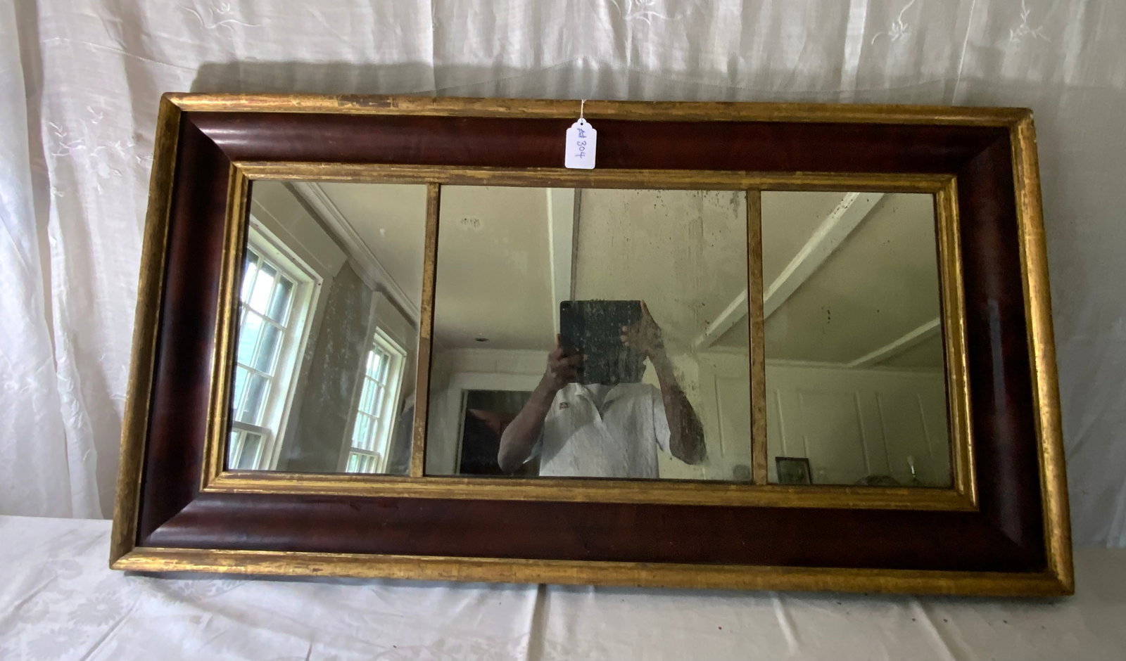 Empire 3-Part Mirror: Empire 3-part mirror w/ ogee frame, 49 1/2" wide x 25 3/4" tall, gold gilt border and interior gold trim. Good condition.