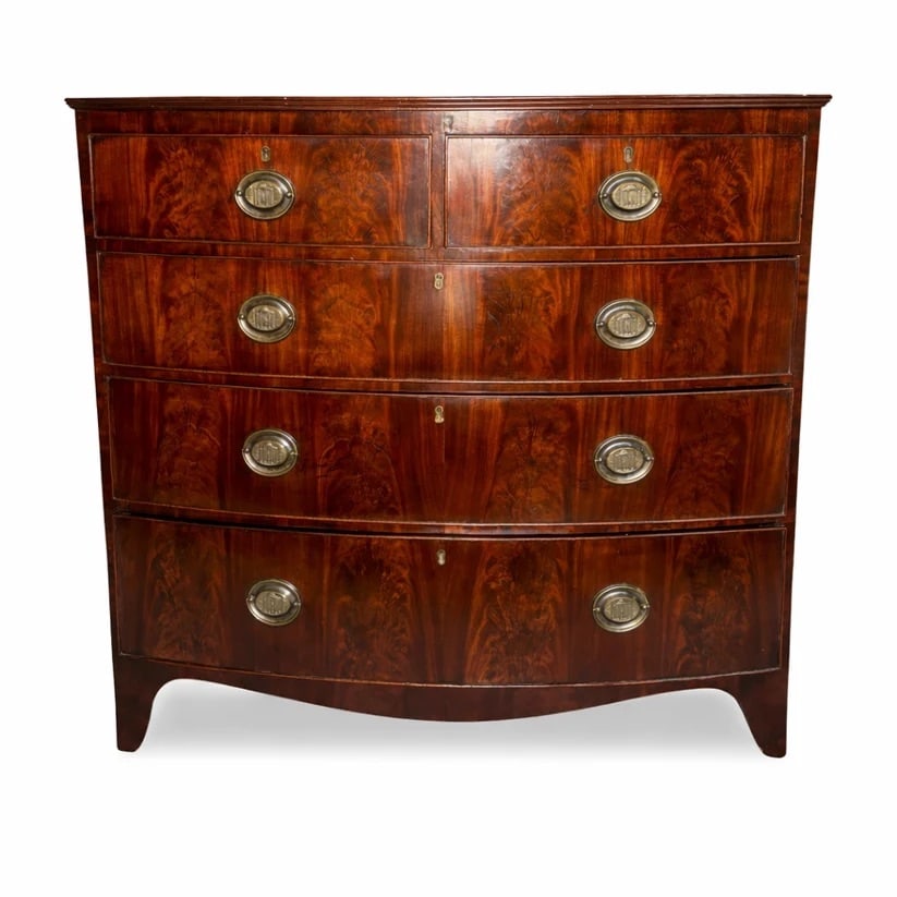Georgian Bow Chested Chest of Drawers: Feathered Mahogany. Compromising of 2 small and 3 large cock-beaded drawers. A very good bow fronted chest. All drawers run well. They have dust panels which prevents dust from running into the