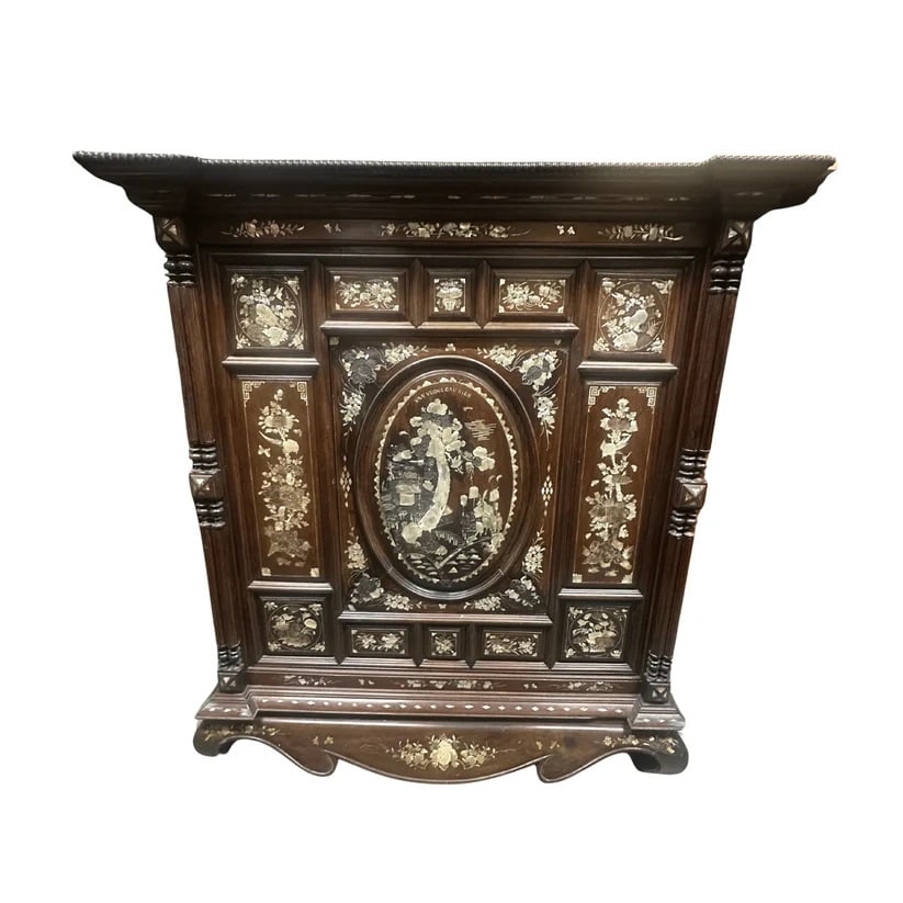 Mid 19th Century Dutch Indonesian Cabinet: A Dutch Indonesian cabinet from the Mid-19th century. This piece is signed by Van Vuong Hien. It's made of special Rosewood with a Mother of Pearl Abalone inlay. The textures and colors between the