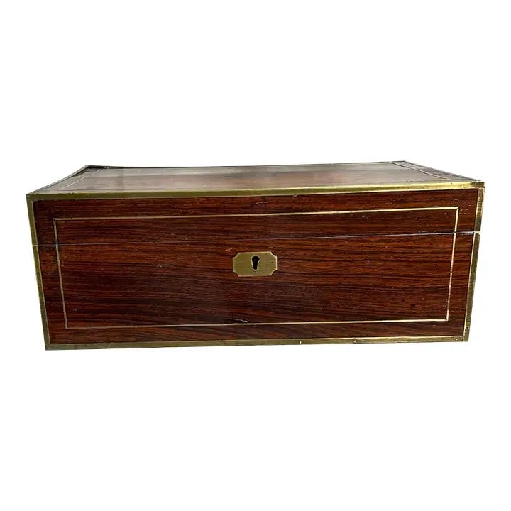 19th Century Lap Desk: This 19th century laptop is also known as a writing slope, or a lap desk! It became wildly popular in the 19th century because a "laptop" provided an expansive flat writing surface that folded up