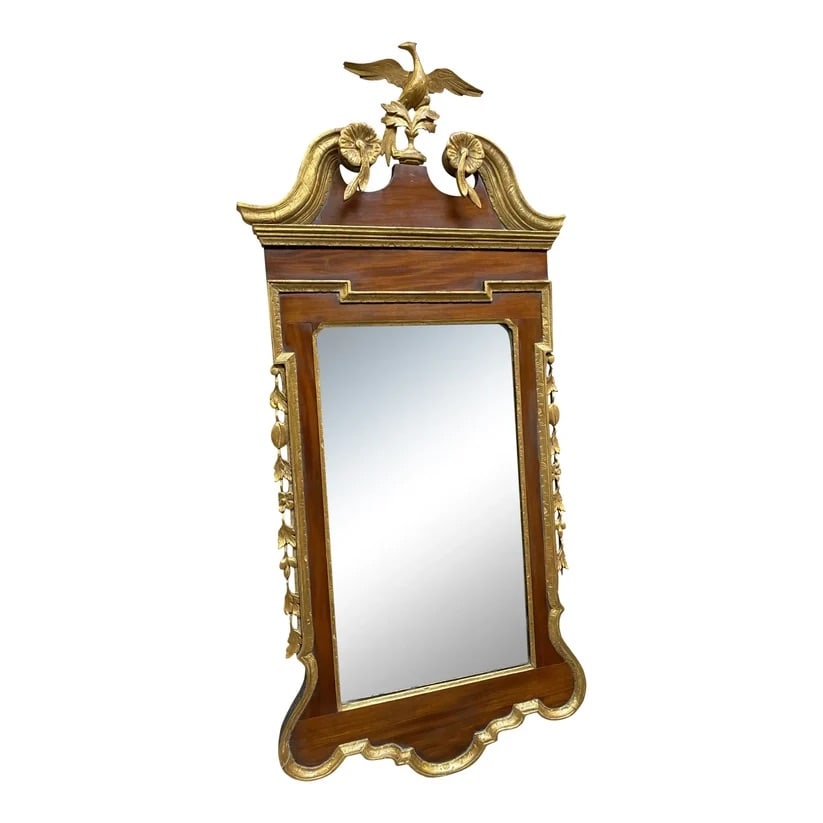 19th Century Federal Style Gilded Mahogany Wall Mirror With Phoenix Crest: True antique Federal style gilded wall mirror, circa 19th century. A carved Phoenix crest surmounts the mahogany frame. The original glazed mirror is flanked by foliate garlands and gilt gardroon