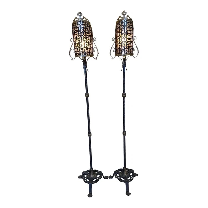 Pair of Venetian 19th Century Wrought Iron Lamps: A beautiful pair of 19th Century Italian Venetian electrical torchères. Hand wrought iron, with bronze and gold gilding and a blackened finish. The shade is a pearly mica encased in metal, cardinal h