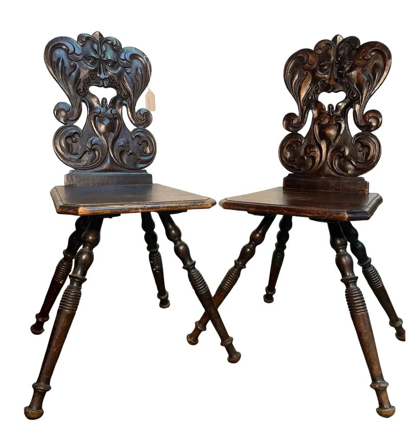Father Wind Spinning Chairs: These wooden chairs were made in the late 1800s and was used for spinning yarn; hence the name "Spinning Chair". Made with strong oak wood; elegant, rich hand-carvings cover the chair head to toe. As 