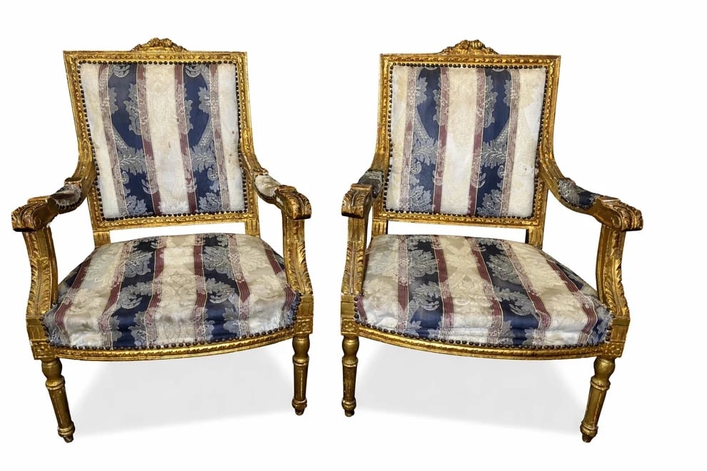 Pair of Venetian 19th Century Wrought Iron Lamps: A beautiful pair of 19th Century Italian Venetian electrical torchères. Hand wrought iron, with bronze and gold gilding and a blackened finish. The shade is a pearly mica encased in metal, cardinal