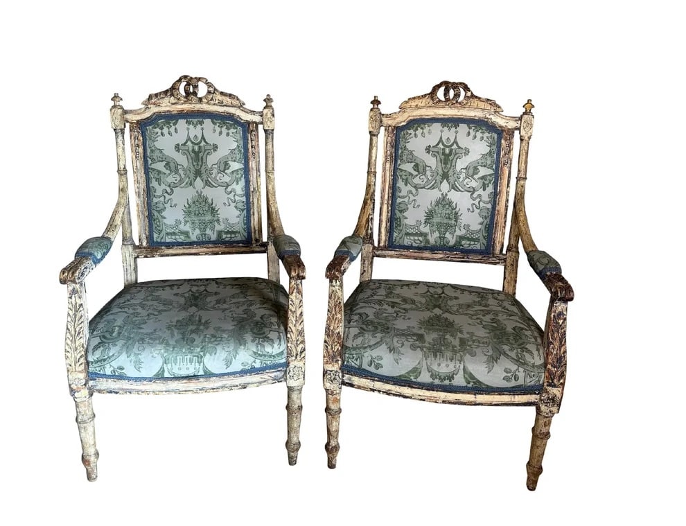 Pair of Moroccan Brass Irons: Moroccan 2 Piece Brass Irons made in the 19th Century with beautiful embellishments of teal, yellow, blue, and red. The colors have faded over the centuries, but it still has immaculate beauty to it.