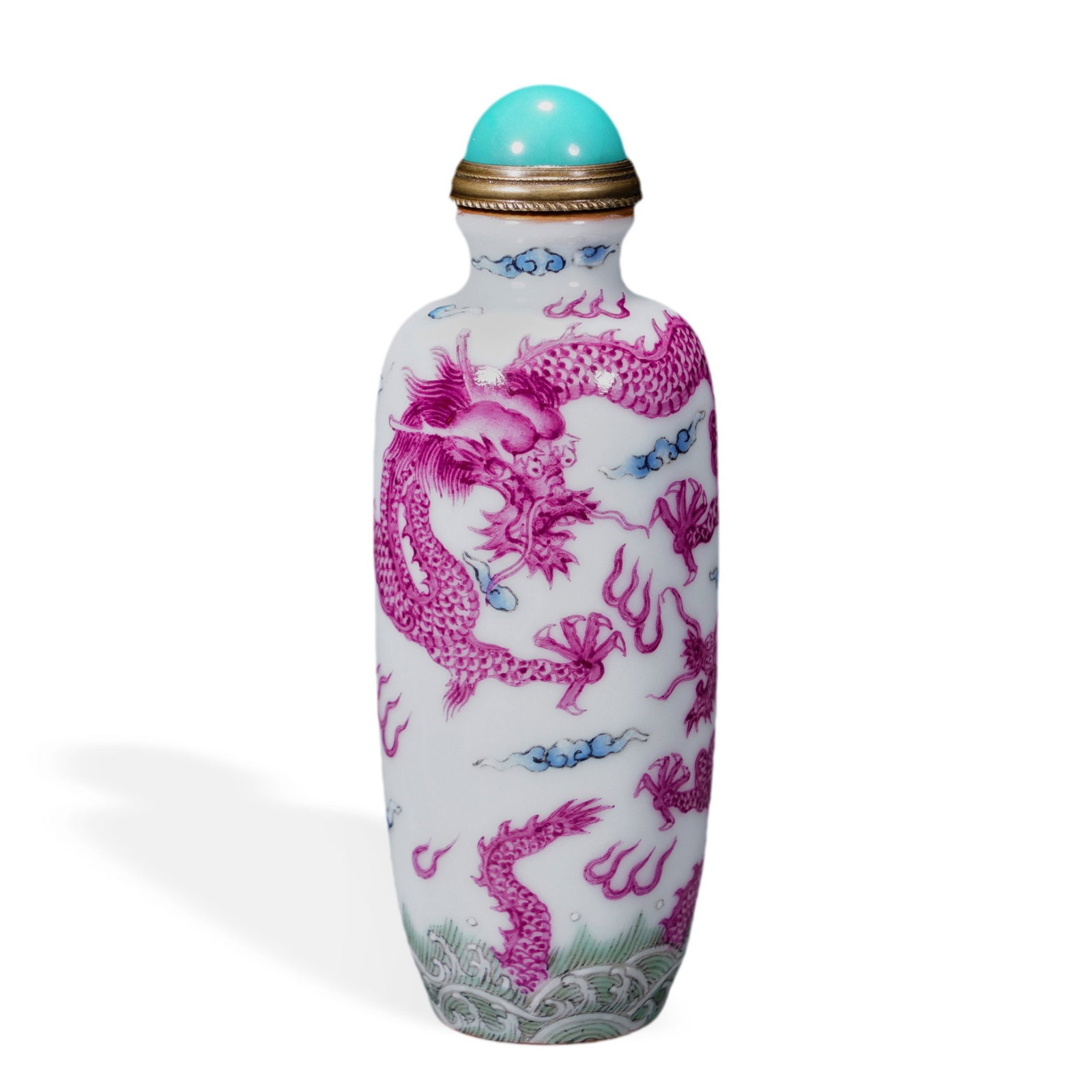 QIANLONG FAMILLE ROSE AND RUBY-RED 'DRAGON' SNUFF BOTTLE: 3 1/2 x 1 1/8 in (9 x 3 cm) Qianlong Famille Rose and Ruby-Red 'Dragon' Snuff Bottle Dimensions: H: 3 1/2 in (9 cm); W: 1 1/8 in (3 cm) This refined small snuff bottle exemplifies the supreme refineme