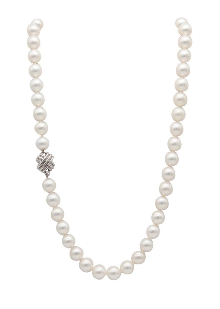 Tiffany & Co. Signature White Pearl & 18Kt Gold Necklace: Tiffany & Co. (American, est. 1837) Signature White Pearl Necklace 18K white gold and pearls Circa 2009 Tiffany & Co. Signature necklace composed of 48 calibrated and well-matched round white 