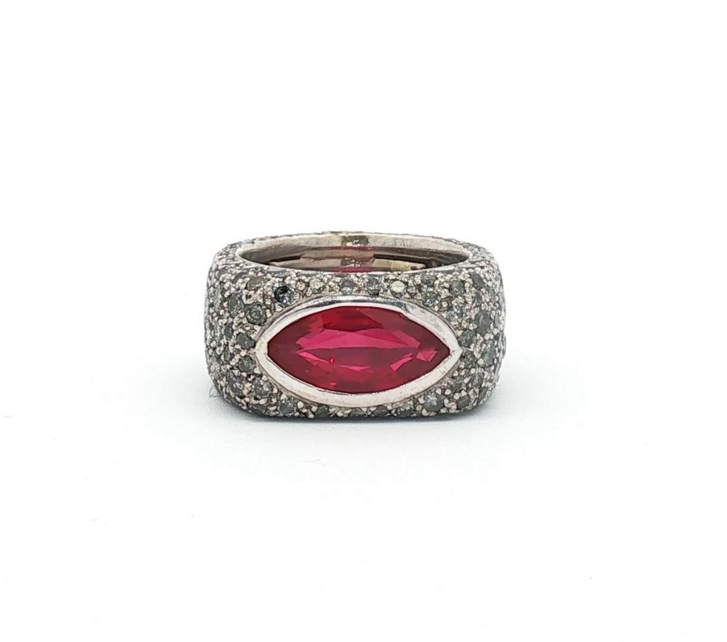 Verney Platinum, Burmese Ruby & Diamond Ladies Cocktail Ring: Verney (French) Platinum, Burmese Ruby & Diamond Ladies Cocktail Ring Verney platinum cocktail ring featuring a 2.45 carat marquise-cut Burmese ruby set east-west in a polished bezel, surrounded b