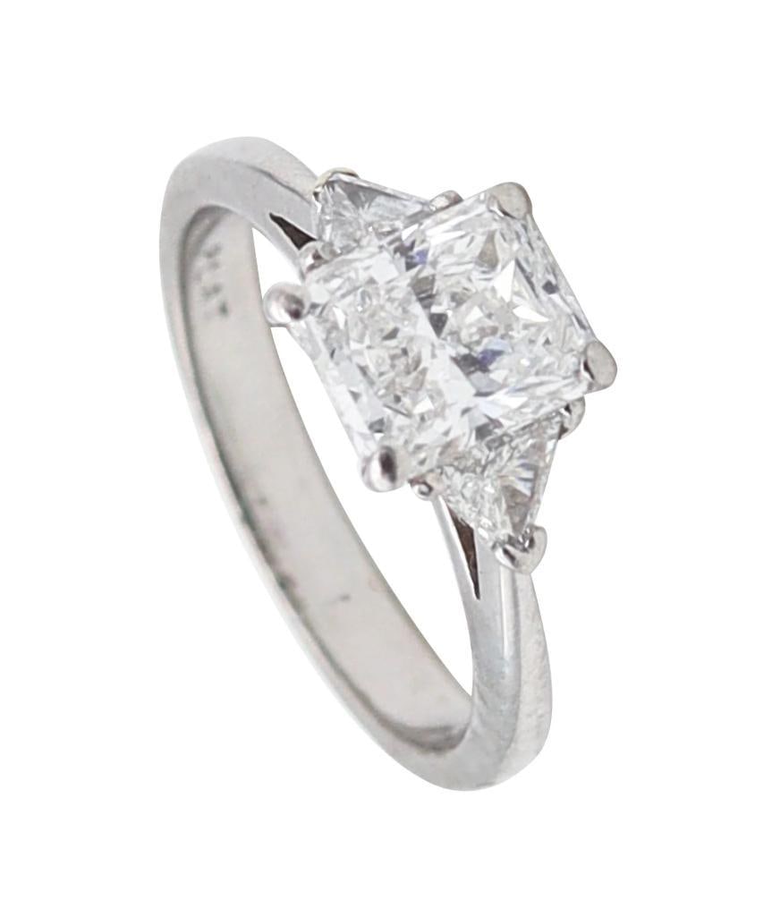 Cartier Platinum Starburst Three-Stone 1.55 ctw. Diamond Ring: Cartier (French, est. 1847) Starburst Three-Stone Diamond Ring Platinum Circa 2000 Cartier Starburst three-stone ring crafted in .950 platinum, centered by a rectangular cut-cornered natural diamond w