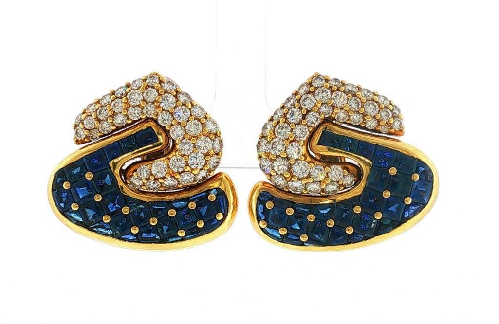 Faraone 18Kt Sapphire & Diamond Ladies Earrings: Faraone (Italian, est. 1856) 18K Yellow Gold, Sapphire & Diamond Ladies Earrings Faraone 18K yellow gold earrings featuring an interlocking swirl design set with approximately 60 calibré squa