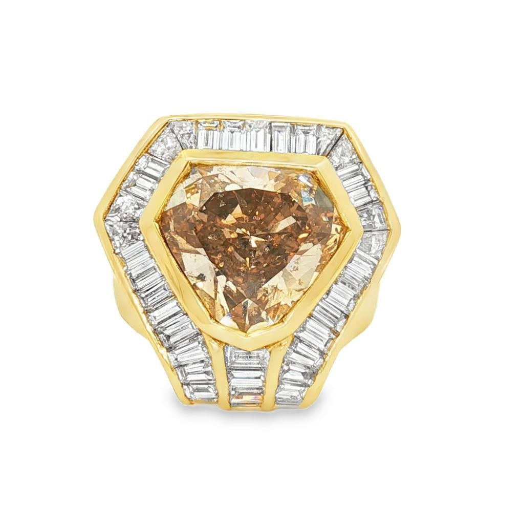 Oscar Heyman 18Kt & Diamond Ladies Cocktail Ring: Oscar Heyman (American, est. 1912) 18K Yellow Gold & Diamond Ladies Cocktail Ring Oscar Heyman 18K yellow gold cocktail ring featuring a 5.97 carat shield-form fancy-color whisky diamond center st