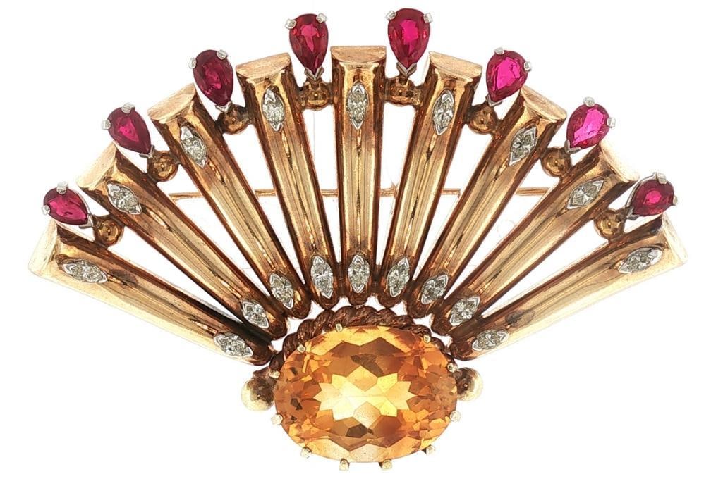 Retro M.C. Mossalone 14Kt Citrine, Ruby & Diamond Fan Brooch: M.C. Mossalone Retro 14K Yellow Gold, Citrine, Ruby & Diamond Fan Brooch M.C. Mossalone Retro-period 14K yellow gold brooch designed as a graduated sunburst fan, centered by an approximately 18.00