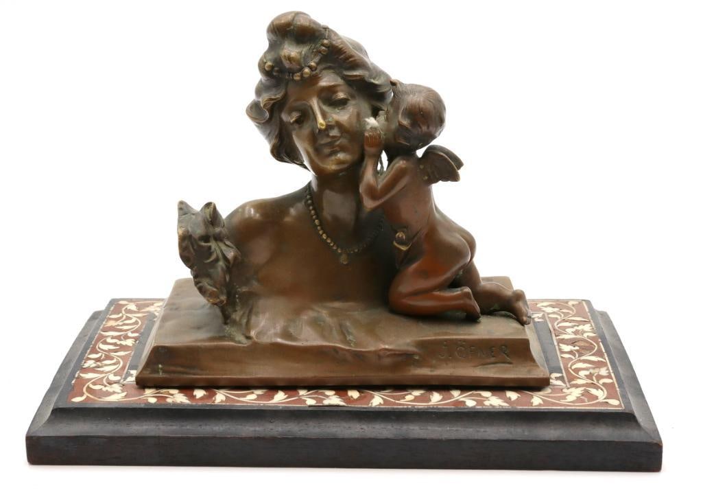 After Josef Öfner (Austrian, b. 1868) Bronze Sculpture: After Josef Öfner (Austrian, b. 1868) Art Nouveau figural bronze sculpture Circa 1900 Patinated bronze figural group depicting a woman with a winged putto and animal figure. Signed “J. Ofne