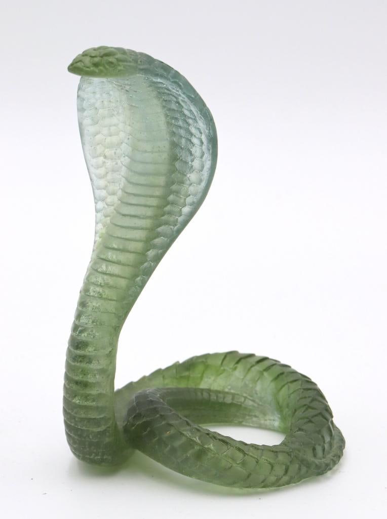 Daum “Rearing Cobra” Crystal Sculpture: Daum France (French, est. 1878) “Rearing Cobra” Pte de verre crystal sculpture Sculptural figure depicting a rearing cobra (snake) with expanded hood and coiled body, rendered in transluce