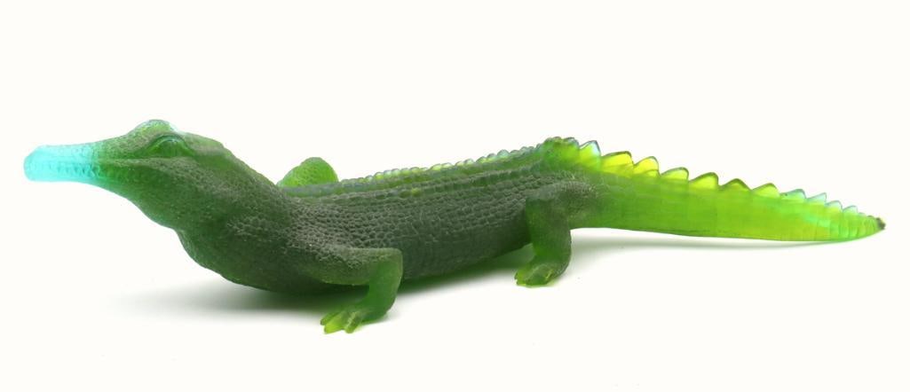 Large Daum “Crocodile” Crystal Sculpture: Daum France (French, est. 1878) “Crocodile” Pte de verre crystal sculpture Large sculptural figure depicting a crocodile rendered in graduated shades of green pte de verre crystal, with a 
