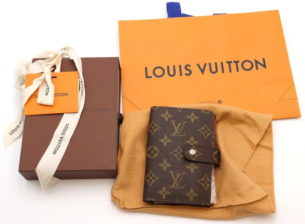 Vintage Louis Vuitton Monogram Canvas Passport Holder/Wallet: Louis Vuitton (French, est. 1854) Vintage Monogram Canvas Passport Holder / Wallet Monogram coated canvas Vintage Louis Vuitton passport holder and wallet crafted in the house’s signature Monogr