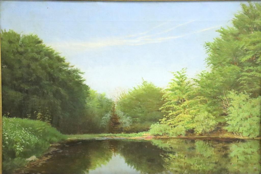 French School (Late 19th C.) Oil Painting on Canvas: French School (Late 19th Century) Wooded River Landscape Oil on canvas Landscape depicting a tranquil river bordered by dense trees and foliage beneath an expansive blue sky. No visible signature. Fra
