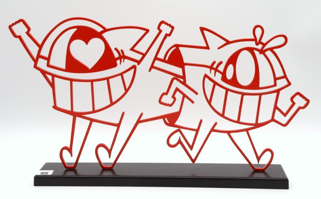 El Pez (Spanish, b. 1976) “My Love is Out” Metal Sculpture: El Pez (Spanish, b. 1976) “My Love is Out” Laser-cut metal sculpture with electrostatic paint, 2018 Red metal sculpture featuring El Pez’s signature grinning figures. Limited edition