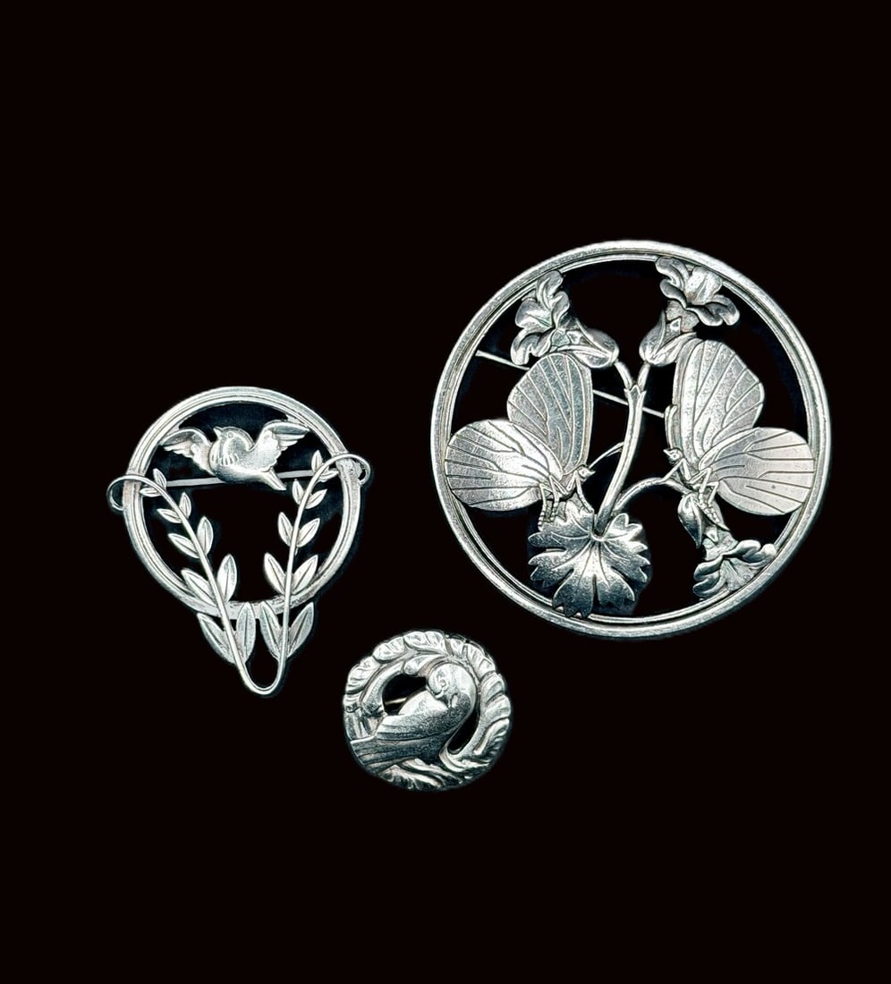 Vintage Georg Jensen lot of three brooches: Vintage lot of Georg Jensen brooches: 1-Moonlight Blossom #283, 1-Dove pin #258, 1-Dove pin #191, all bear the Georg Jensen correct markings