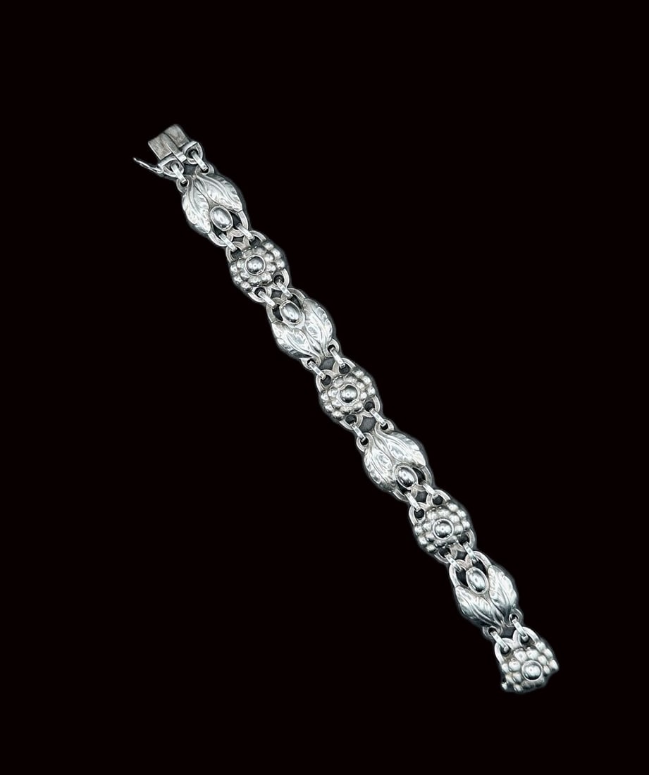 Vintage Georg Jensen #3 bracelet: Vintage Georg Jensen # 3 bracelet, 7.5 inches, featuring stylized floral clusters and engraved leaf links marked with 925 Denmark #3 oval Georg Jensen
