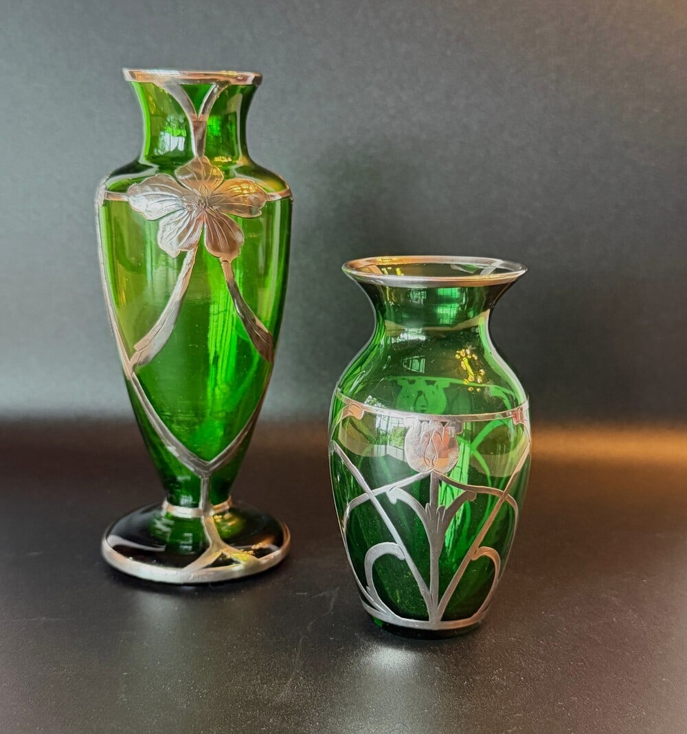 A pair of sterling overlay Art Nouveau green art glass vases Circa 1895-1910: Very nice pair of sterling overlay vases in green glass, American circa 1895-1910 one being 5 inces and the other 3 inches appox both with stylized florals