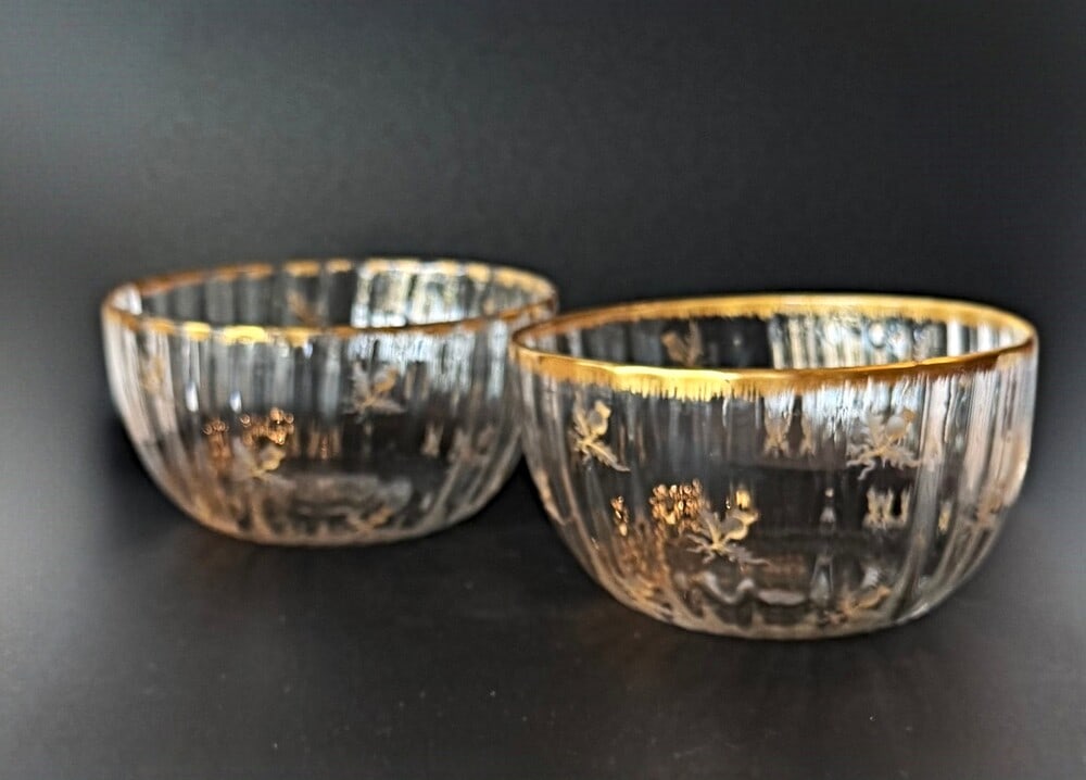 A fine pair of Daum Nancy Art Nouveau enamaled glass "Thistle Bowls" c.1900: Elegant bowls feature a fluid vetical ribbing that forms a subtle scalloped rim like a flower corolla the surfaces are decorated with gold thisle and a dripping rim signed Daum Nancy with the cross of