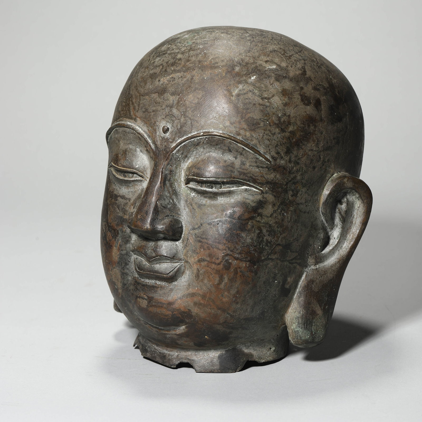 A BRONZE BUDDHA HEAD - 2