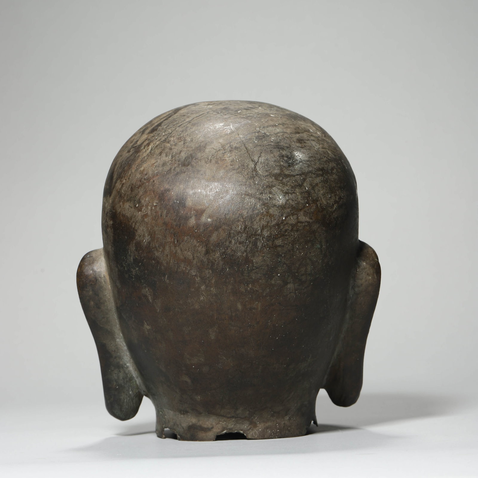 A BRONZE BUDDHA HEAD - 4