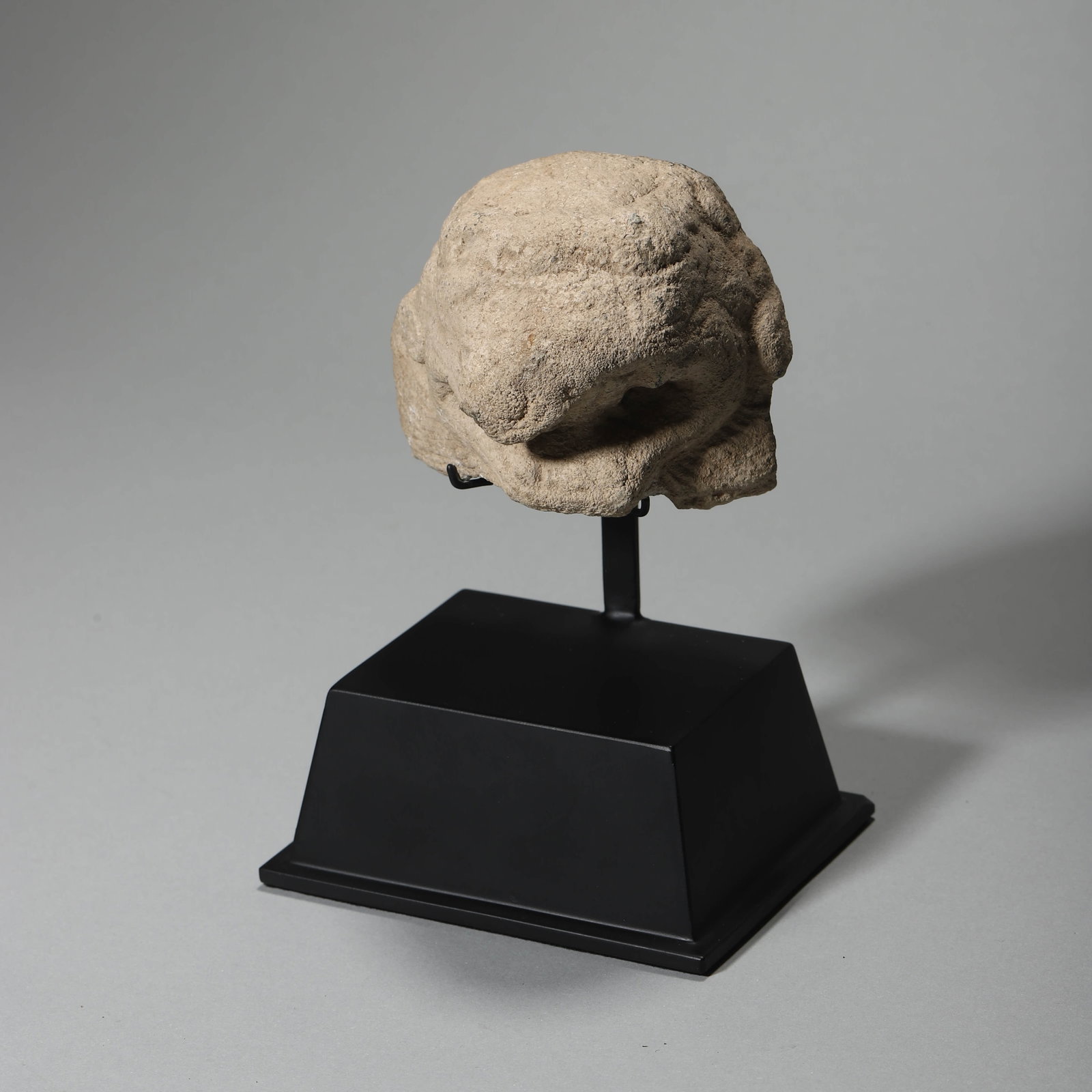 A STONE-CARVED LION HEAD - 2