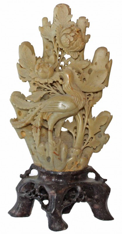 Chinese Soapstone Carving: This is a Chinese Soapstone Carving of a bird, possibly a pheasant or a peacock, in a thicket of flowers. DIMENSIONS: Height: 9 3/8 inches Length: 4 1/2 inches Width: 2 1/2 inches