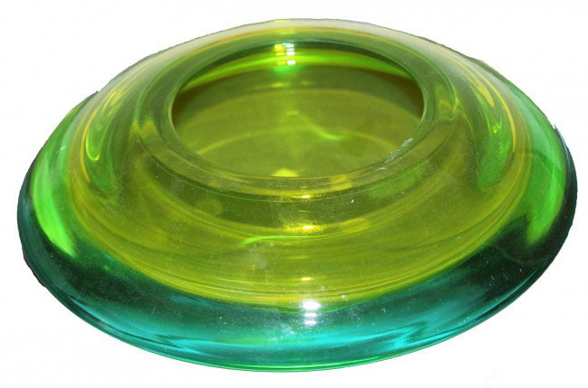 Murano Glowing Uranium Bowl: Extraordinary glowing lemon yellow sommerso bowl with an applied outer rim of aqua. This piece is made of uranium glass so it really glows under black light. It is attributed to Luciano Gaspari for Sa