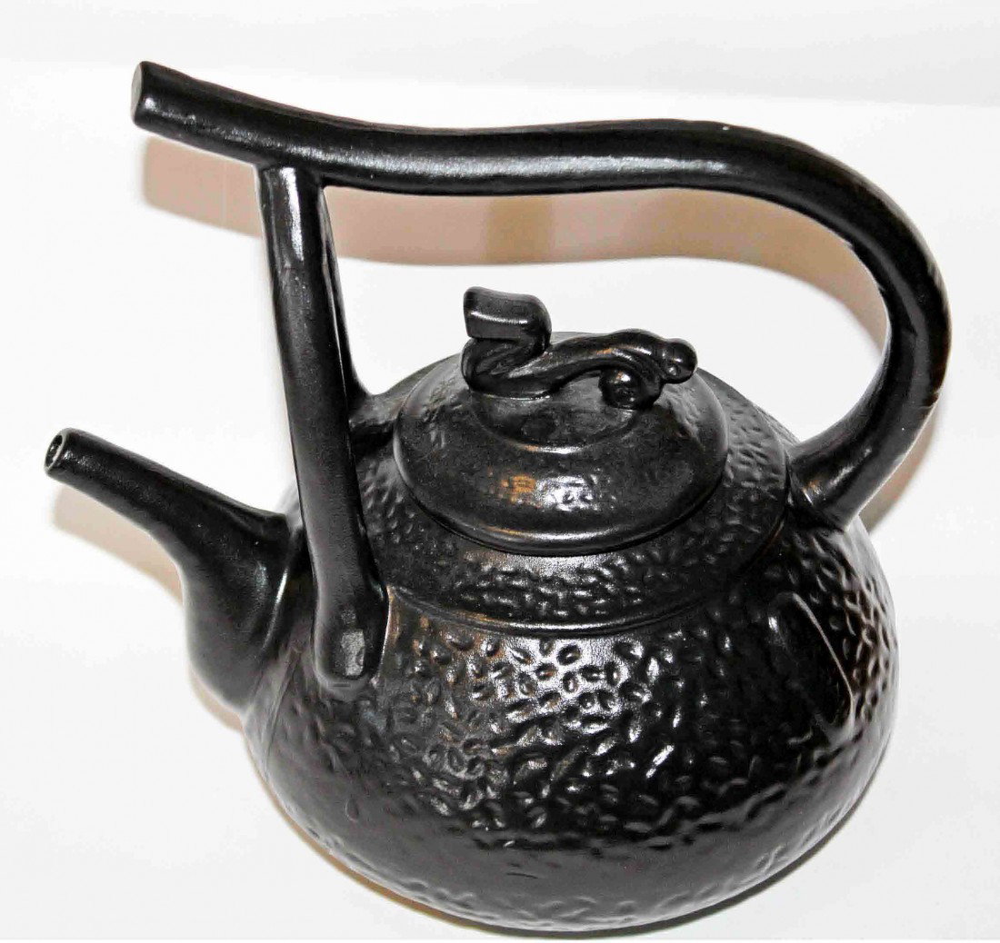 Ceramic Korean Teapot: Black ceramic Korean Teapot. No rust, calcium or iron deposits inside. Signature on the side. DIMENSIONS: Length: 8.75 inches Width: 6.5 inches Height: 8.75 inches