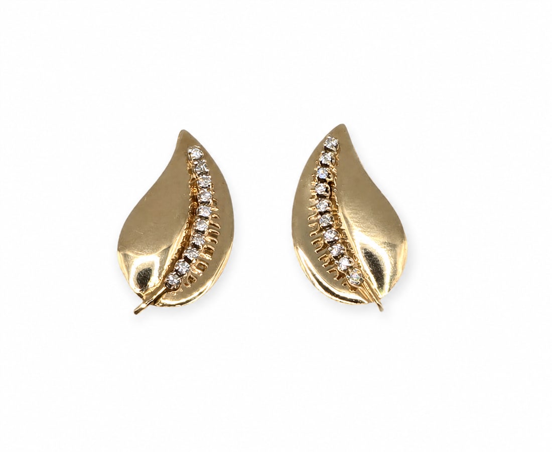 Yellow gold and diamonds leaf earrings: A 14kt yellow gold and Diamond leaf earrings. 0.20 cts tw diamonds 1 x.50 inch. 4.35 grams