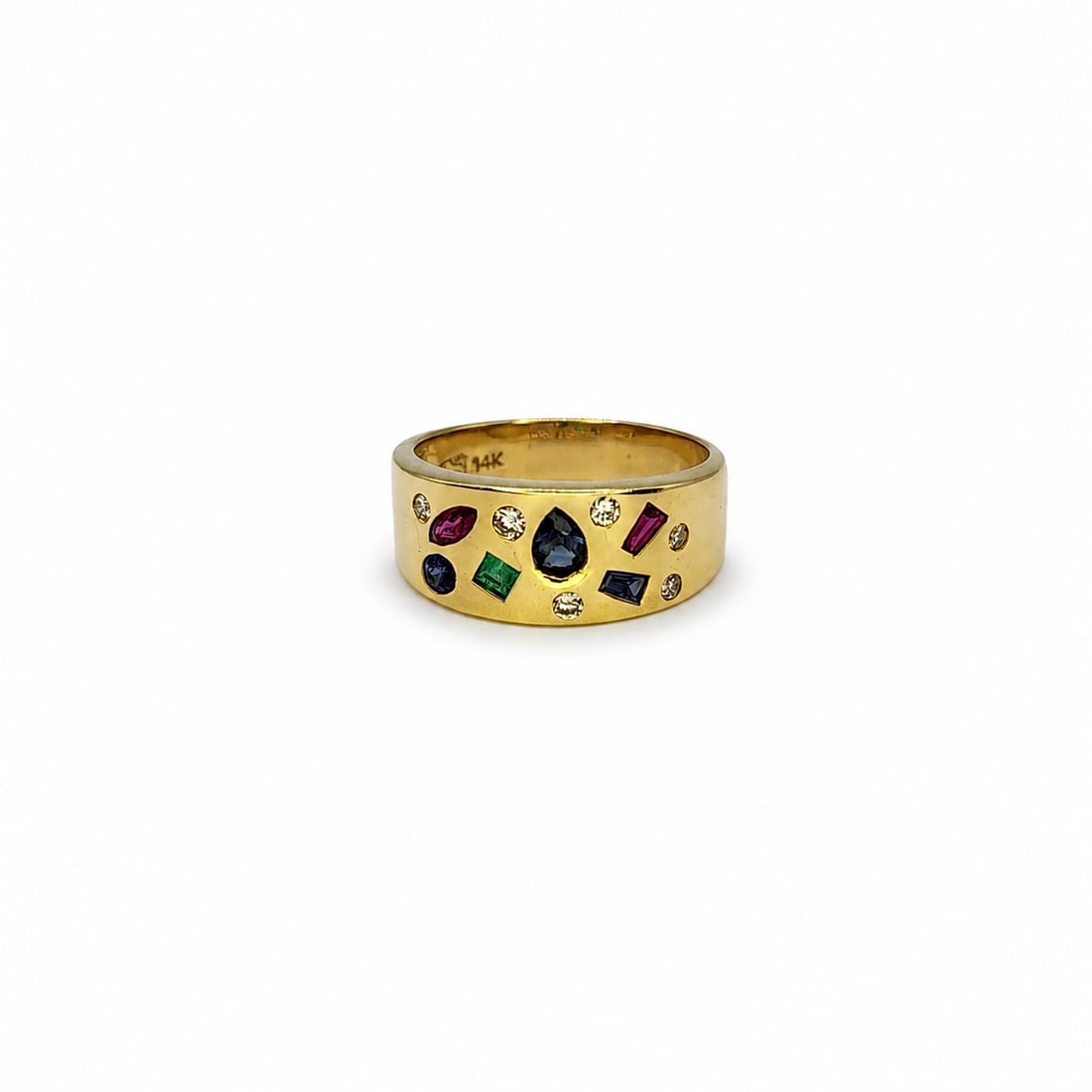 Yellow gold diamond & gems ring: A 14kt yellow gold ring. Diamond, ruby, sapphire and emerald. Size 7. 5.55 grams