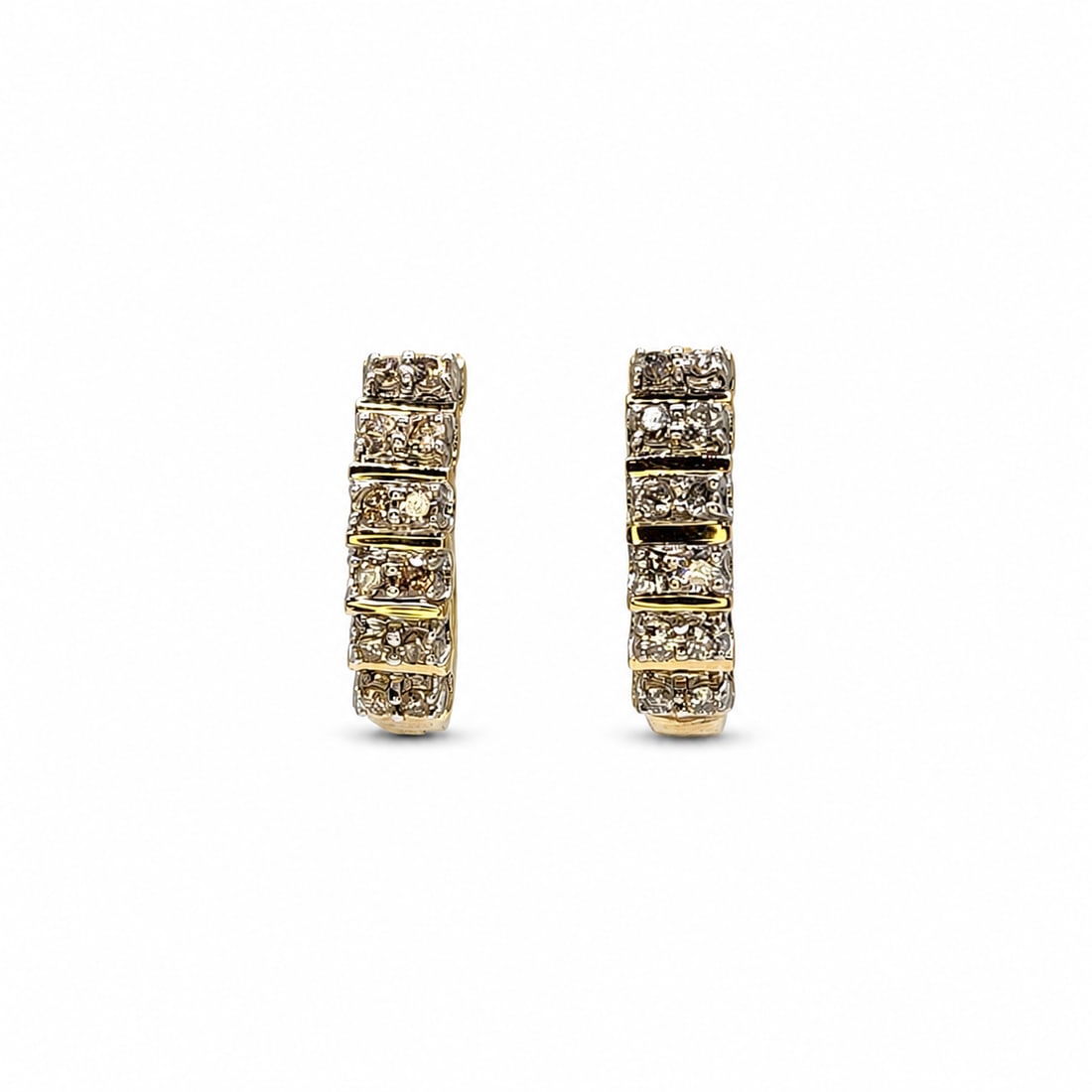 Yellow gold diamond earrings: A 14kt yellow gold earrings. 24 round Diamonds total, .75ct. tw. .86x.23 inches. 7 grams
